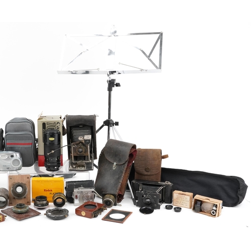 470 - Vintage and later cameras, lenses and accessories including Yashica, Canon and Kodak