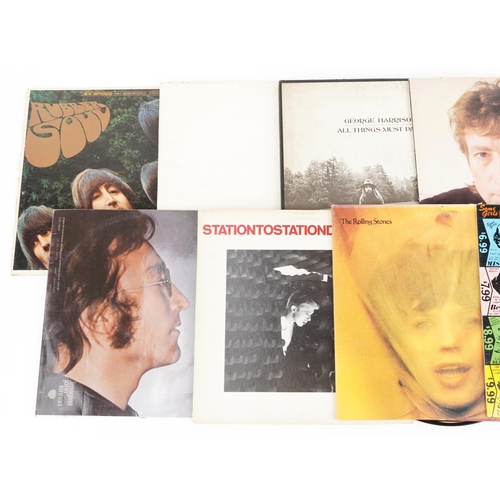 518 - Vinyl LP records including The Beatles, The Rolling Stones, David Bowie and John Lennon