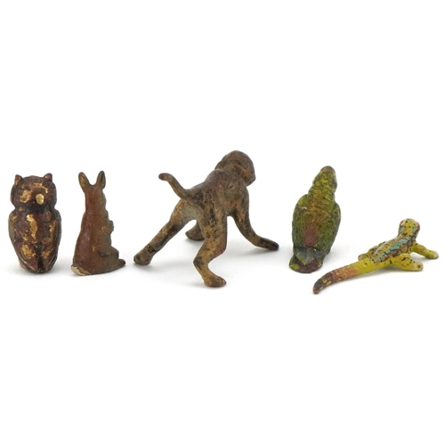 299 - Four miniature cold cast bronze animals and one other including monkey, owl and rabbit, the largest ... 