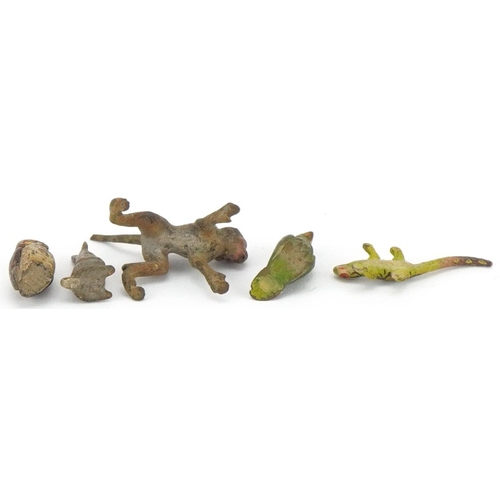 299 - Four miniature cold cast bronze animals and one other including monkey, owl and rabbit, the largest ... 