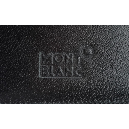 392 - Montblanc black leather hand held organiser case with certification card, 12.5cm x 9.5cm