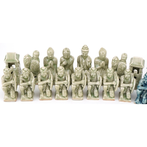 557 - Chinese porcelain chess set, the largest piece 10.5cm high