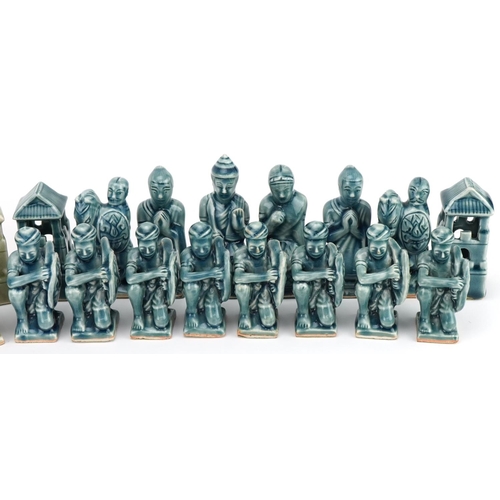 557 - Chinese porcelain chess set, the largest piece 10.5cm high