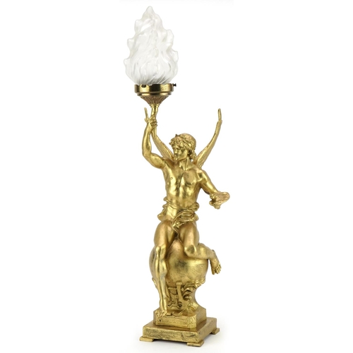 After Marcel Debut, gilt spelter table lamp in the form of Le Génie des Arts, 57cm high