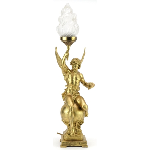 94 - After Marcel Debut, gilt spelter table lamp in the form of Le Génie des Arts, 57cm high