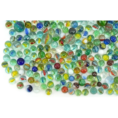 555 - Collection of vintage and later glass marbles including cat's eye and milk glass examples