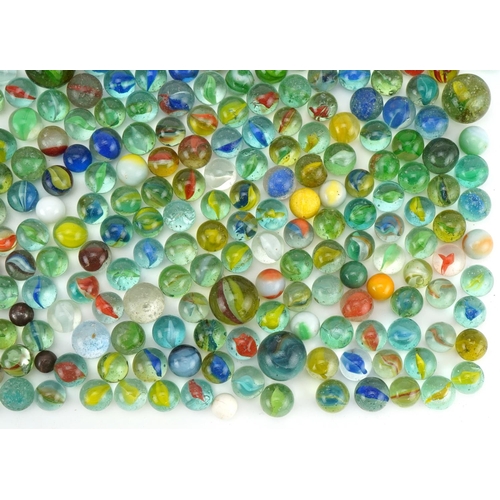 555 - Collection of vintage and later glass marbles including cat's eye and milk glass examples