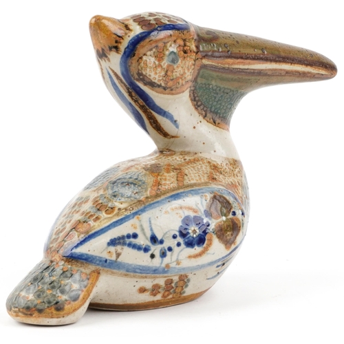 334 - Studio pottery model of a pelican hand painted with flowers, 25cm high