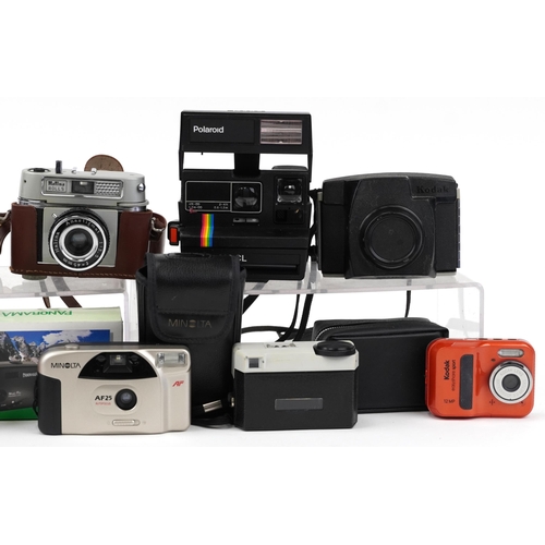 468 - Vintage and later cameras and accessories including Zenit-E, Halina Rolls and Minolta AF25