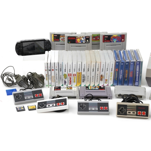 649 - Games consoles, games and accessories including Nintendo NES Version console, Dreamcast games, Ninte... 