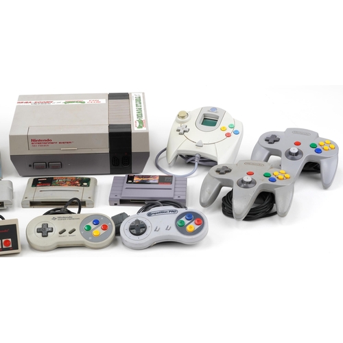 649 - Games consoles, games and accessories including Nintendo NES Version console, Dreamcast games, Ninte... 