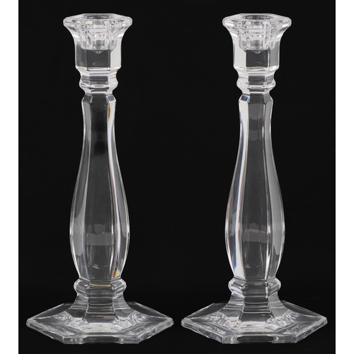 1182 - Pair of Tiffany & Co hexagonal glass candlesticks, each 24cm high