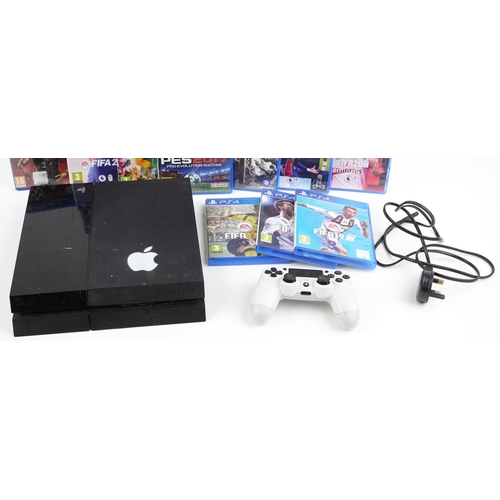 648 - Sony PlayStation 4 games console with controller and games including FIFA 17, 18, 19, 20, 21, 22, W2... 