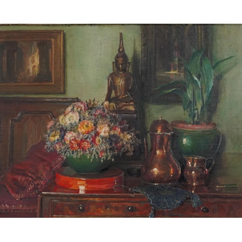 C M Wood - Chinese Buddha and flowers on a sideboard, oil on board, contemporary framed, James Bourlet  & Sons 17 & 18 Nassau Street London W1 paper label to the reverse 38cm x 30cm
