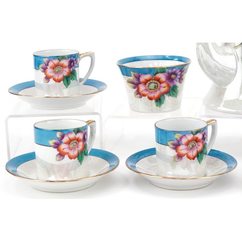 23 - Noritake porcelain coffee set hand coloured with flowers, the coffee pot 17cm high