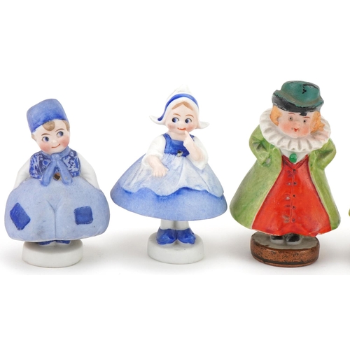 262 - Selection of novelty bisque Dutch boy and girl nodders, the largest 9cm