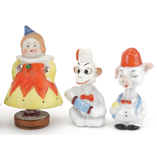 262 - Selection of novelty bisque Dutch boy and girl nodders, the largest 9cm