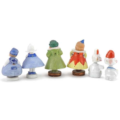 262 - Selection of novelty bisque Dutch boy and girl nodders, the largest 9cm