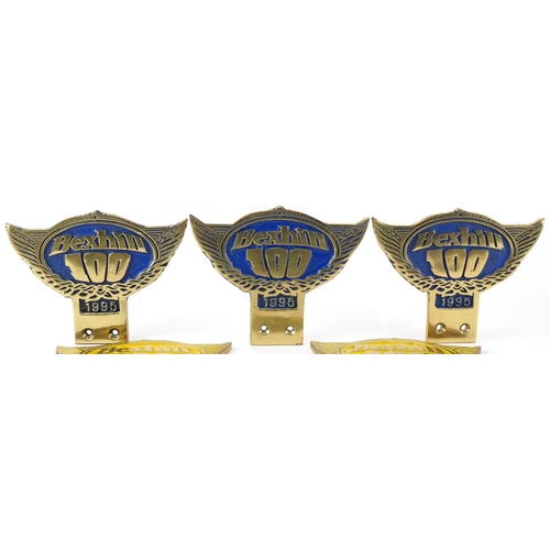 1468 - Six motoring interest Bexhill 100 brass car badges 1995 and 1997, each 10cm high