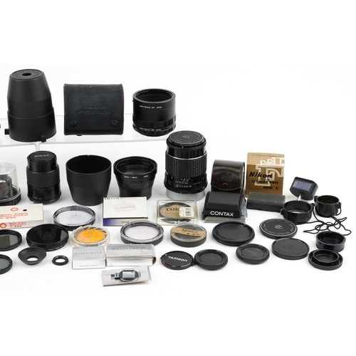 466 - Camera lenses including Nikon Vivitar, Pentax and wide angle lenses and filters