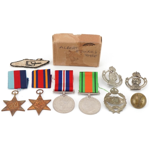 1510 - British Military interest World War II medals for Albert Edward Joyce, Tank Corps badges and patches