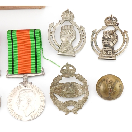 1510 - British Military interest World War II medals for Albert Edward Joyce, Tank Corps badges and patches