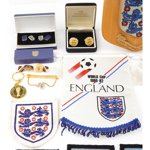 1438 - English football memorabilia including pennants, Football Association wooden plaque, patches, cuffli... 