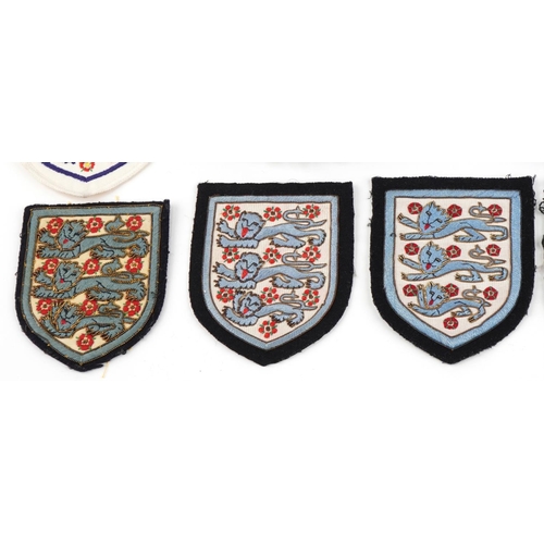 1438 - English football memorabilia including pennants, Football Association wooden plaque, patches, cuffli... 