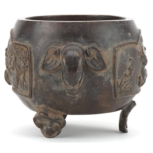 354 - Chinese bronze three footed censer cast with wild animals and elephant head handles, 16cm wide