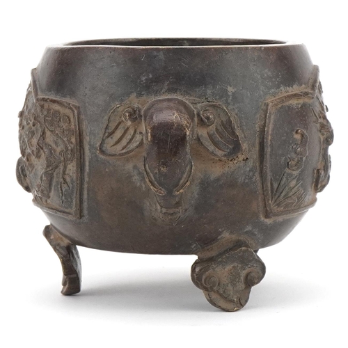 354 - Chinese bronze three footed censer cast with wild animals and elephant head handles, 16cm wide