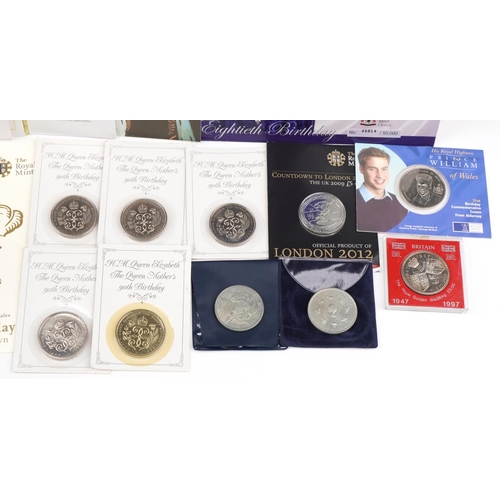 1282 - Sixteen commemorative British five pound coins, some in folders and booklets