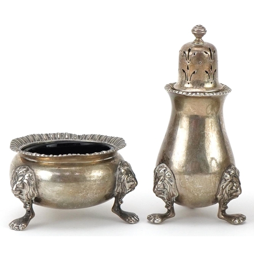 2443 - William Suckling, George V silver three piece cruet raised on lion mask and paw feet, Birmingham 192... 