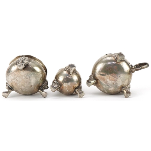 2443 - William Suckling, George V silver three piece cruet raised on lion mask and paw feet, Birmingham 192... 