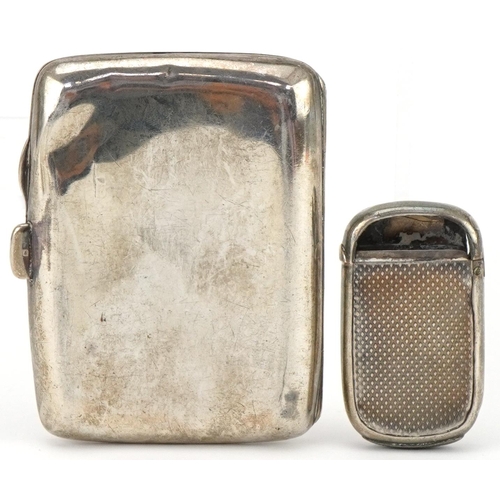 2441 - Rectangular silver cigarette case and an engine turned silver vesta, the largest 8.5cm wide, total 8... 