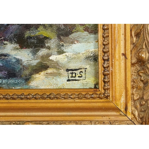 57 - Children playing in the ocean, oil on board, bearing the monogram DS, gilt framed, 38.5cm x 28cm