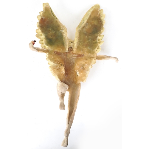 1074 - Neil Wilkinson, contemporary resin wall sculpture of a mythical winged nude female holding an apple,... 