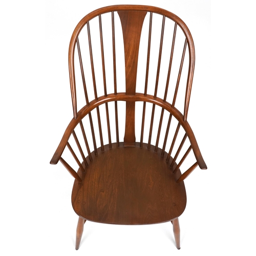 1001 - Ercol elm stick back armchair with crinoline stretcher, 107cm high