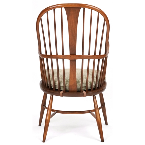 1001 - Ercol elm stick back armchair with crinoline stretcher, 107cm high