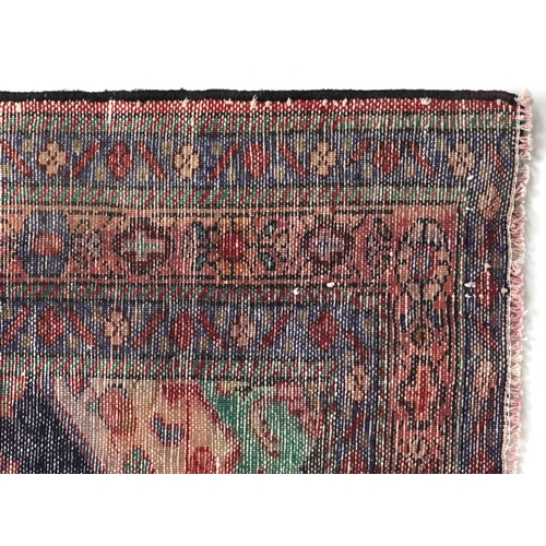 1030 - Rectangular Hamadan rug having an allover geometric floral design onto a predominantly red and blue ... 