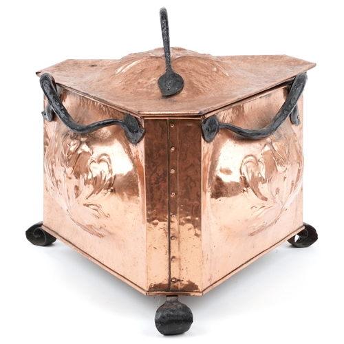 Arts & Crafts triangular copper coal box with wrought iron strapping, feet and handle, 44cm high