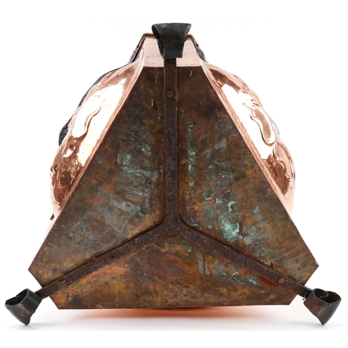 131 - Arts & Crafts triangular copper coal box with wrought iron strapping, feet and handles, decorated wi... 