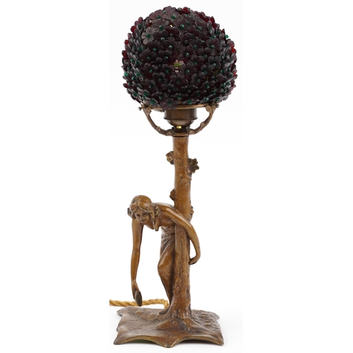 225 - Art Nouveau patinated metal table lamp of a young girl collecting water from a pond with floral glas... 