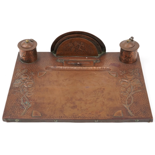 109 - Arts & Crafts wooden and copper desk stand decorated with stylized flowers, 44cm x 34cm