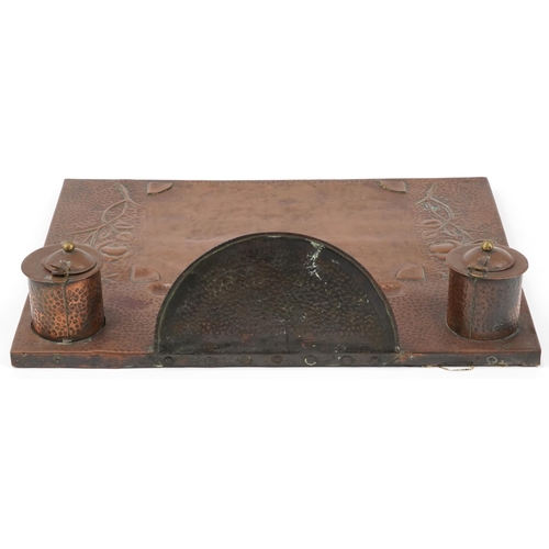 109 - Arts & Crafts wooden and copper desk stand decorated with stylized flowers, 44cm x 34cm