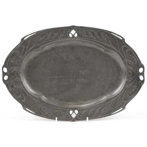 499 - Art Nouveau pewter tray with stylized decoration, 40cm in diameter