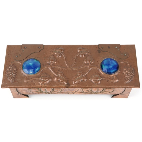 106 - Arts & Crafts Liberty style copper casket inset with Ruskin cabochons, decorated with vines and grap... 