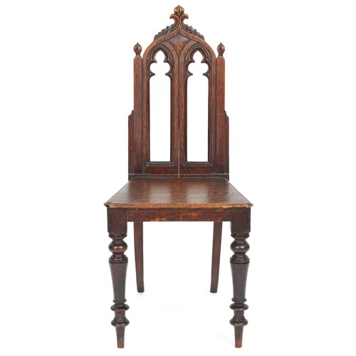 1026 - Victorian oak Gothic chair with carved back, 94cm high