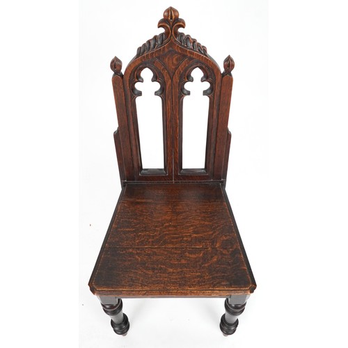 1026 - Victorian oak Gothic chair with carved back, 94cm high