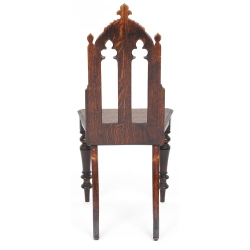 1026 - Victorian oak Gothic chair with carved back, 94cm high