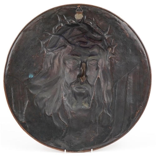 113 - Large Arts & Crafts copper wall plaque of Christ with crown of Thorns, 47cm high